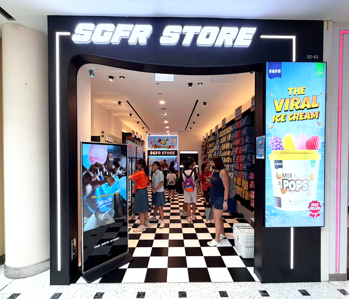 Inside an SGFR store, themed shelves and collectibles